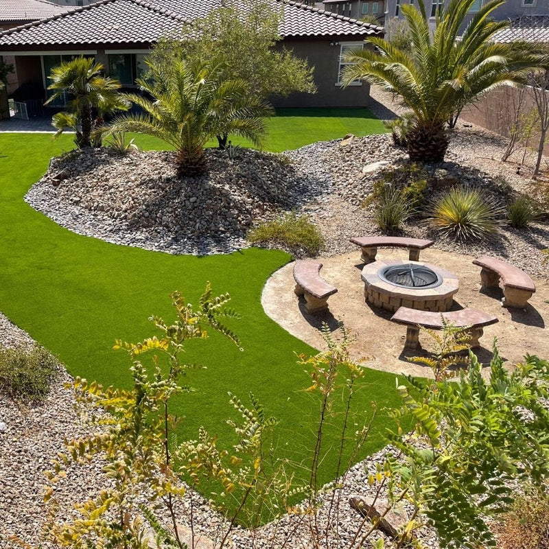 Turf seating and fire-pit common area with desert planting